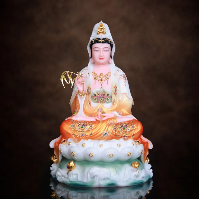 Mẫu tượng Phật Bà Quan Âm ngồi đế non nước với áo cam tươi sáng mang lại năng lượng bình an