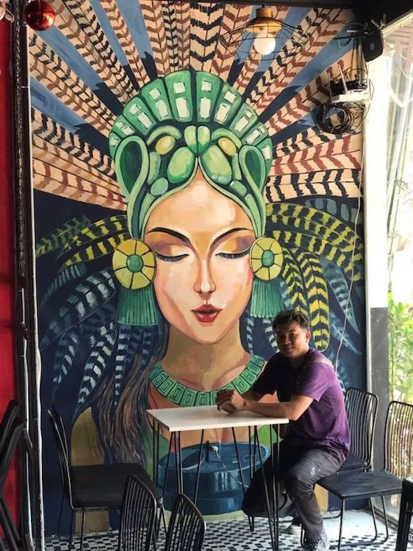 Cân bằng màu sắc và bố cục là yếu tố quan trọng khi vẽ tranh tường quán cafe