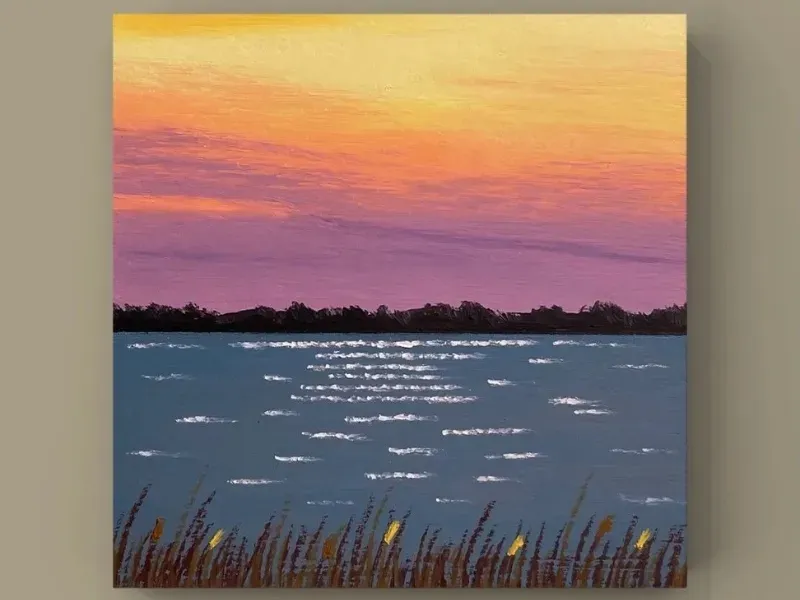 Hoàng hôn hồ lấp lánh bên lau sậy