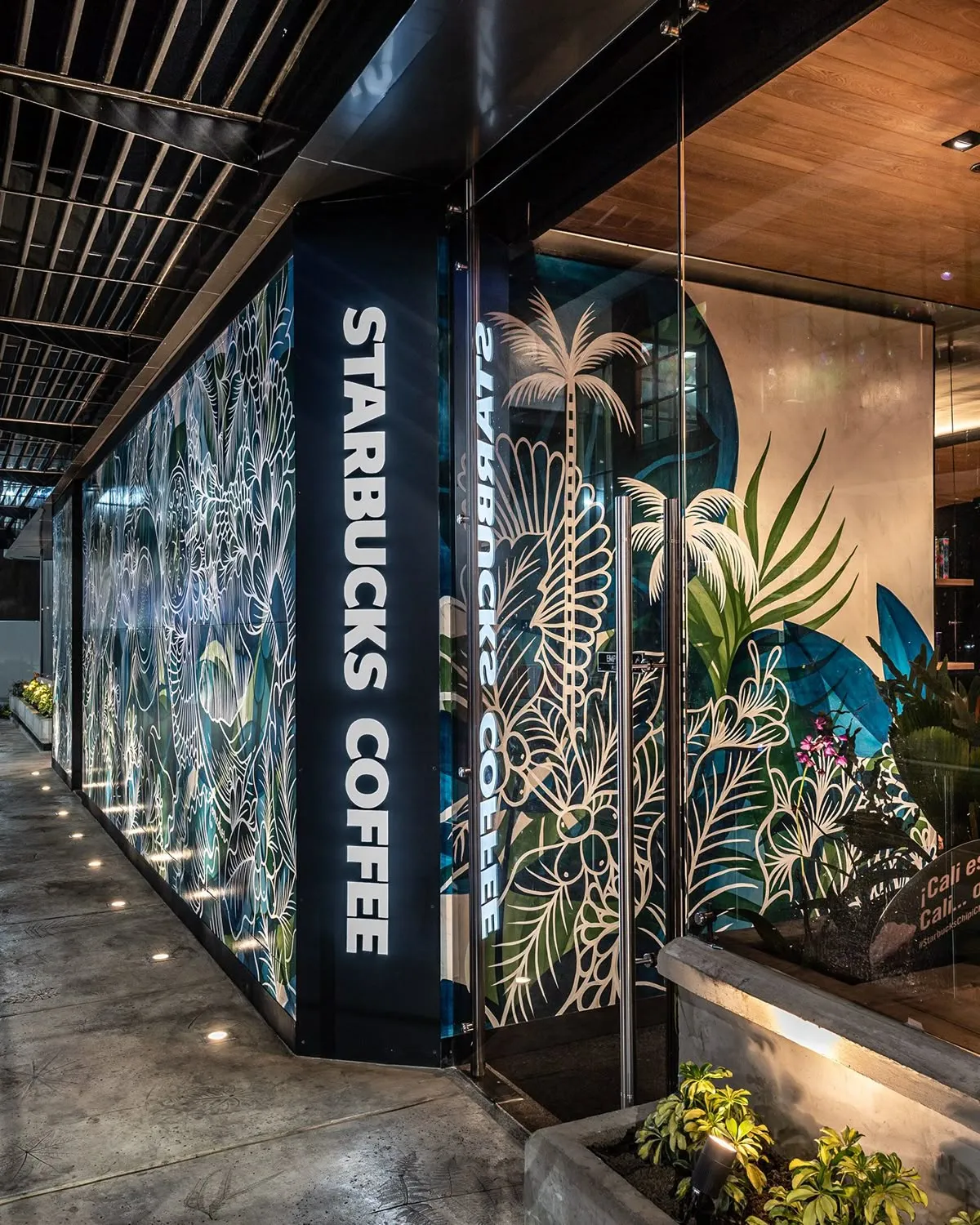 Mẫu vẽ tranh tường quán cafe phong cách hiện đại giúp không gian trở nên lôi cuốn