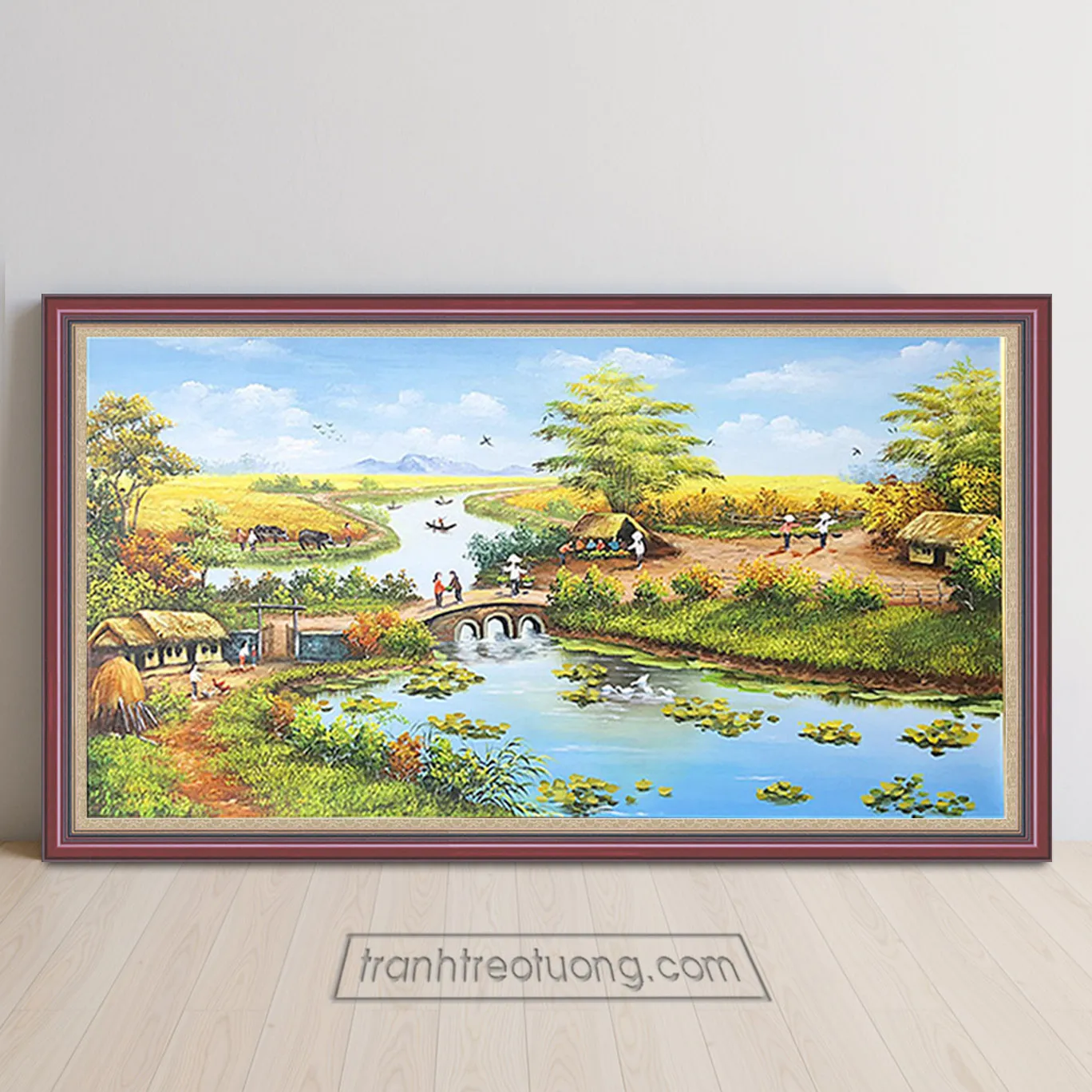 Ngôi nhà tranh ven sông với cây cầu gỗ nhỏ và cánh đồng lúa chín vàng bao quanh