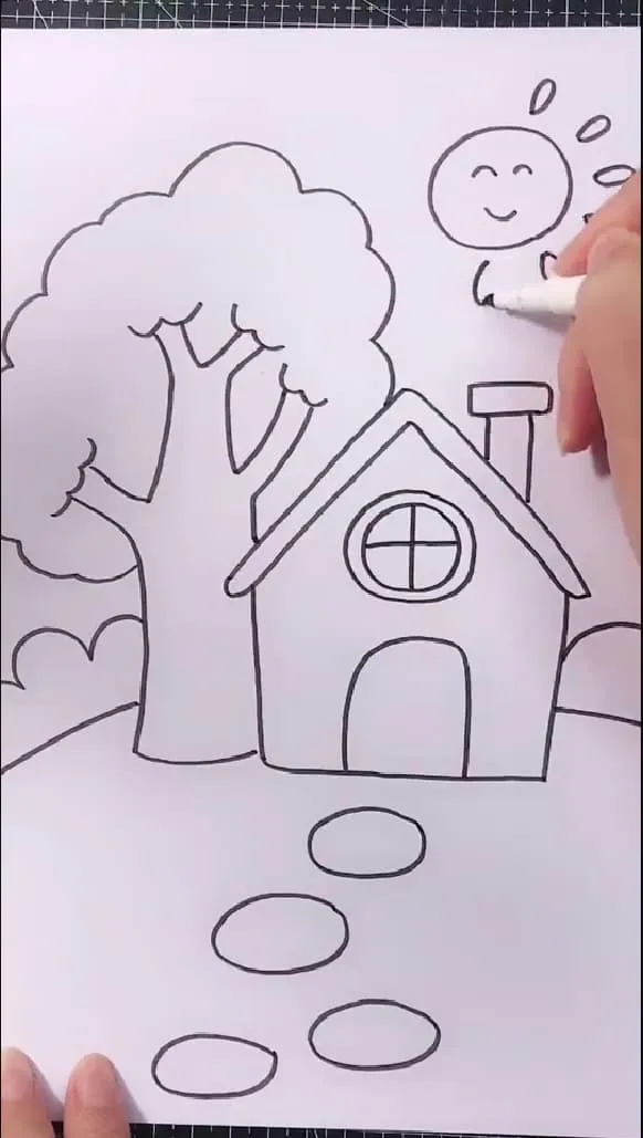 Tạo hình ông mặt trời và các chi tiết nền cho bức tranh thêm sinh động